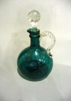 Appraisal: A th century green glass decanter with clear glass rope