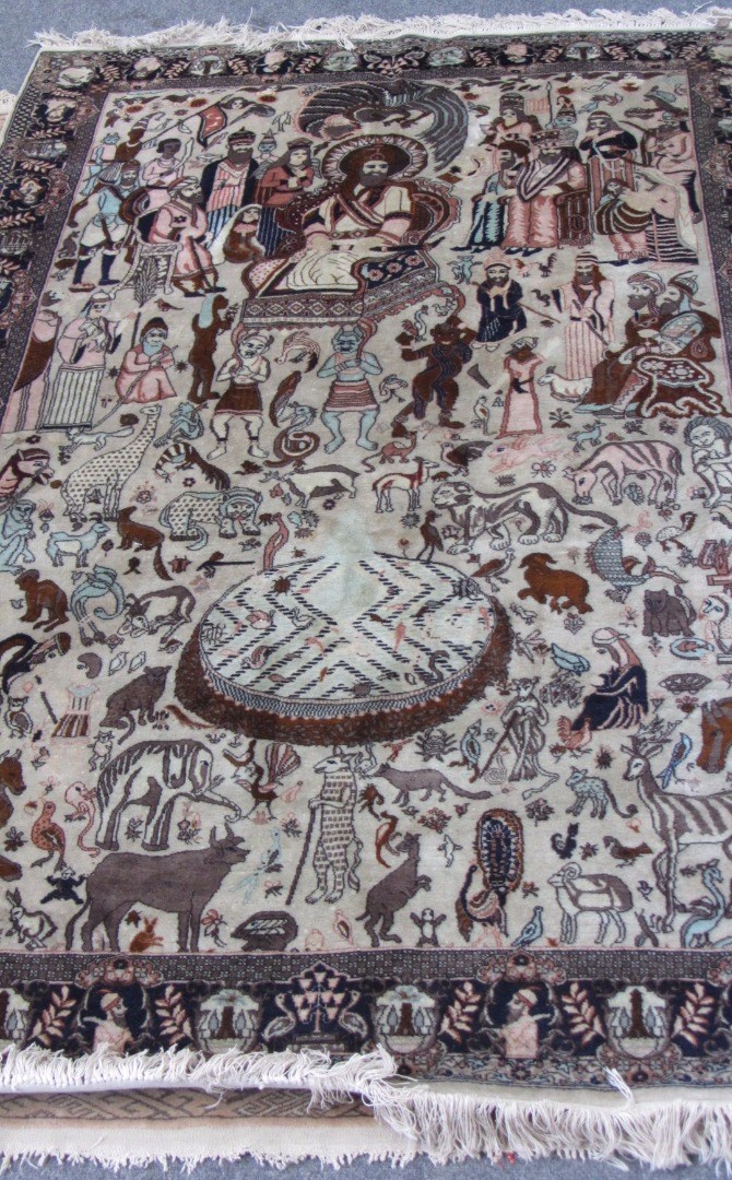 Appraisal: A Tabriz pictorial rug Persian- the grey field filled with