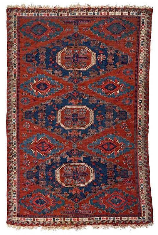 Appraisal: Soumak Rug circa dark blue central medallion running dog border