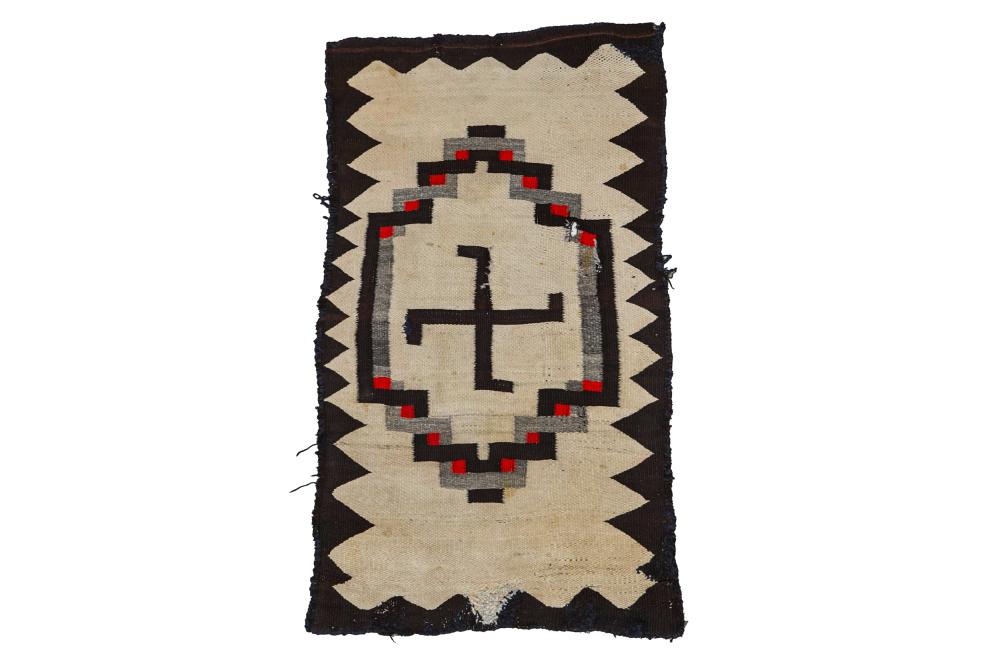 Appraisal: NAVAJO WOOL RUGfour winds motif in brown grey and red