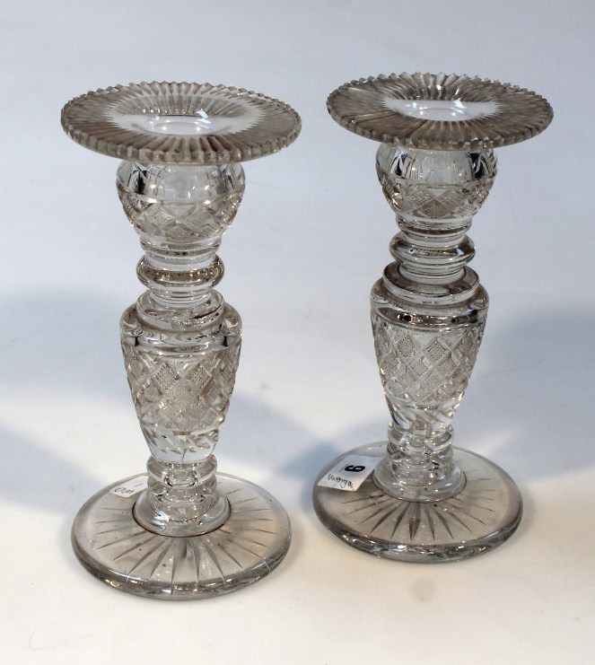 Appraisal: A pair of thC cut glass candlesticks with wide rims