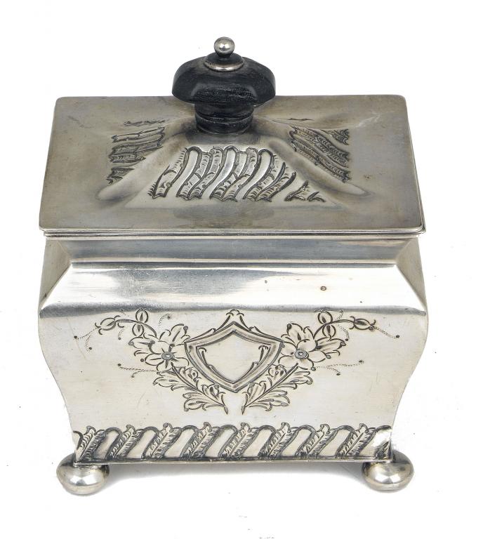 Appraisal: A VICTORIAN EMBOSSED TEA CADDY of sarcophagus form on bun