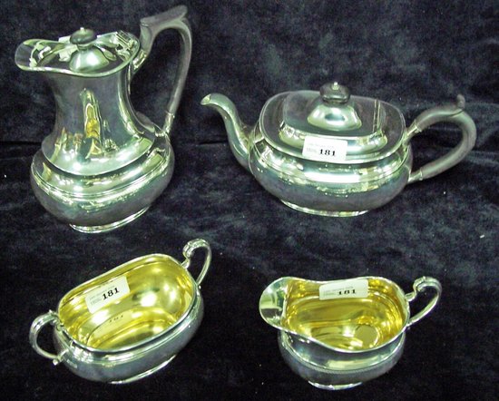 Appraisal: A four-piece silver tea service of rounded oblong form Sheffield