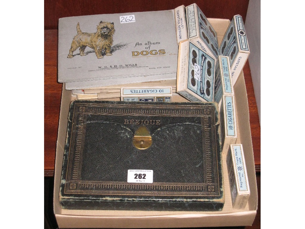 Appraisal: Lot comprising cased Bezique set and albums and loose cigarette