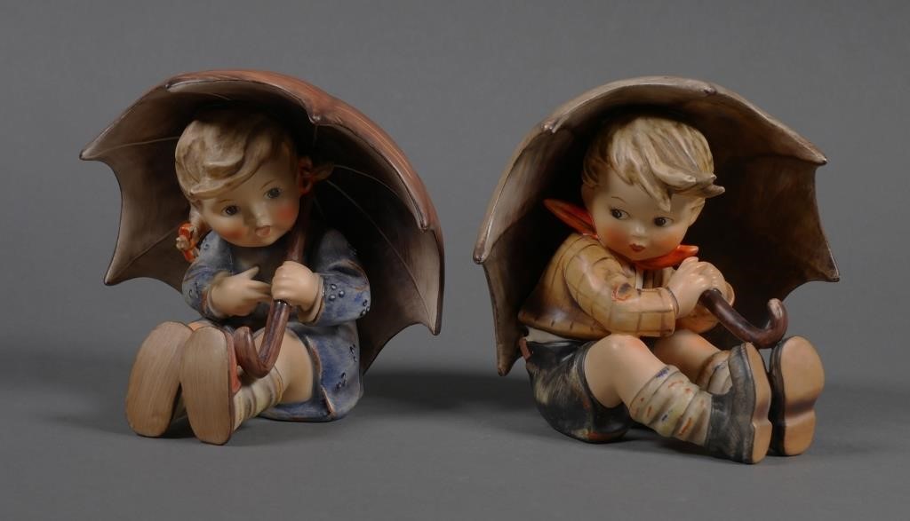 Appraisal: Hummel set Umbrella Boy Girl Both figurines have incised mold