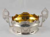 Appraisal: A two handled silver bowl formed and engraved in the