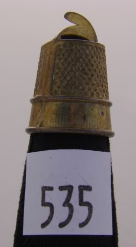 Appraisal: Seam ripper thimble with partially opened top