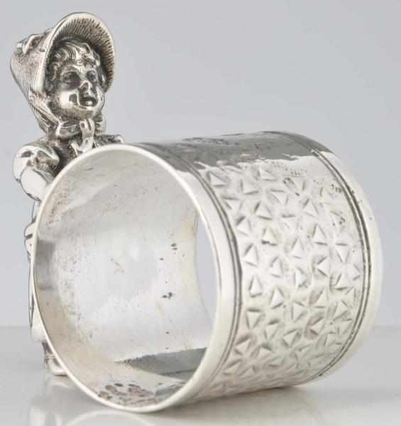 Appraisal: Kate Greenaway Figural Napkin Ring Girl pushed napkin holder Condition