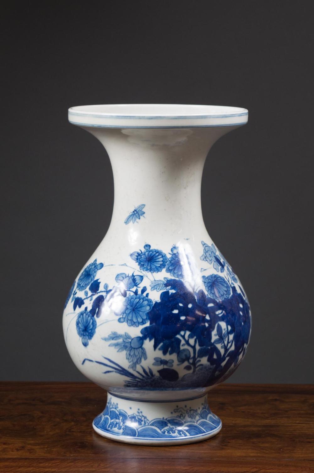 Appraisal: CHINESE BLUE AND WHITE PORCELAIN FOOTED VASE with wide opening