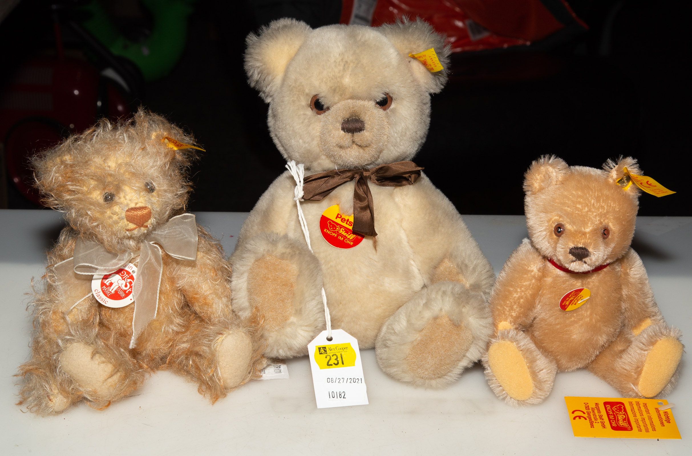 Appraisal: THREE STEIFF PLUSH BEARS Includes small jointed bear small jointed