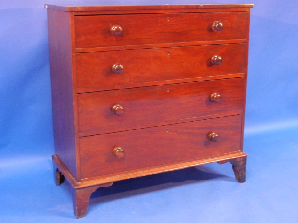 Appraisal: A Georgian figured mahogany chest of four long graduated drawers