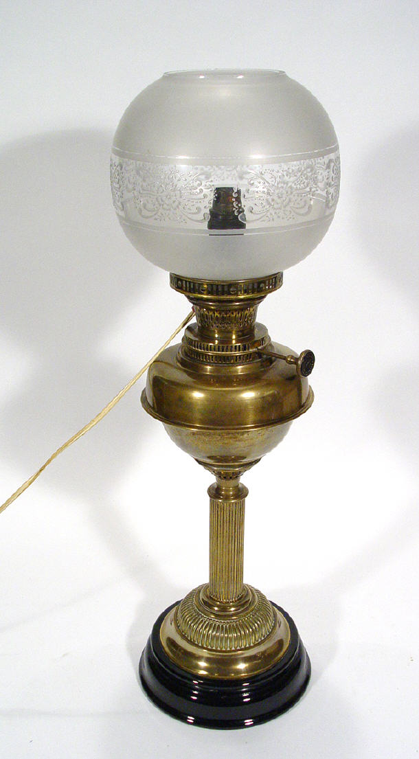 Appraisal: Reeded brass pedestal oil lamp with etched glass shade by