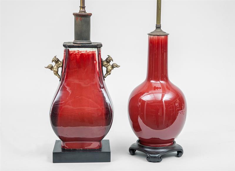 Appraisal: Two Ox Blood Pottery Lamps One with gilt-metal fu dog