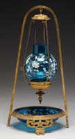 Appraisal: HANGING CANDLE LAMP Cast brass holder with sapphire blue dish-style