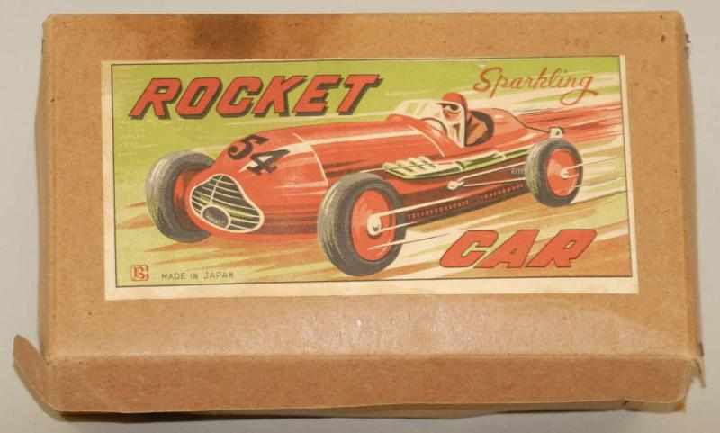 Appraisal: Japanese Friction Bandai Tin Litho Rocket Car Includes original box