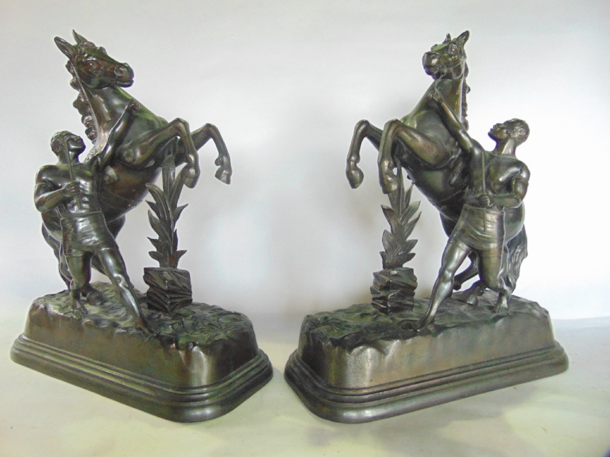 Appraisal: Sculpture A good quality matched symmetrical pair of cast metal