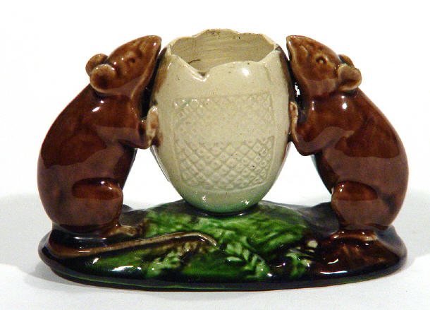 Appraisal: Watcombe pottery match striker modelled as two mice flanking an