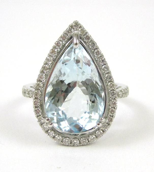 Appraisal: AQUAMARINE DIAMOND AND FOURTEEN KARAT GOLD RING The white gold