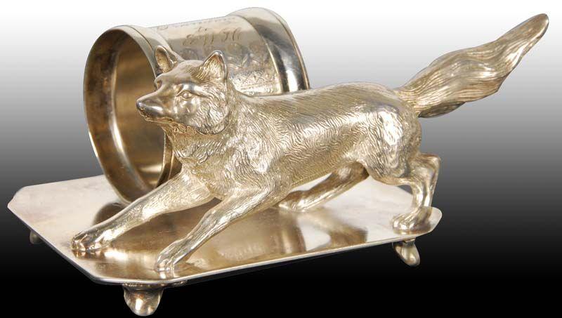 Appraisal: Large Running Fox Figural Napkin Ring Description Footed base Marked