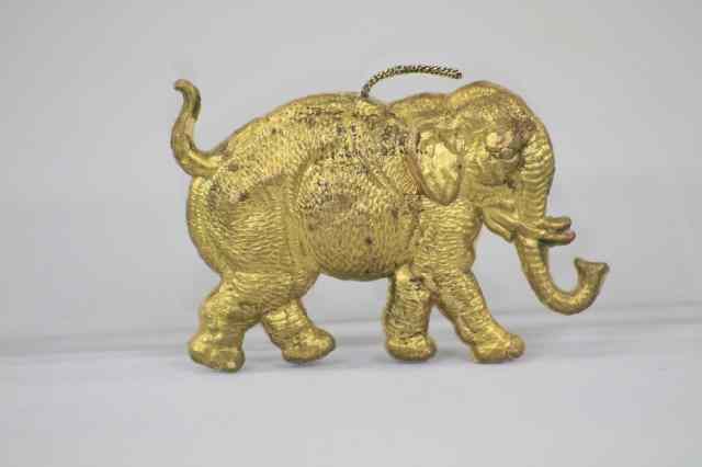 Appraisal: GOLDEN DRESDEN ELEPHANT Germany small golden Dresden elephant with lowered