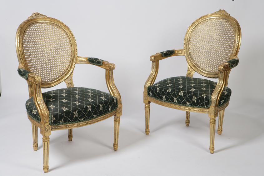 Appraisal: A PAIR OF LOUIS XVI STYLE GILTWOOD SALON CHAIRS with