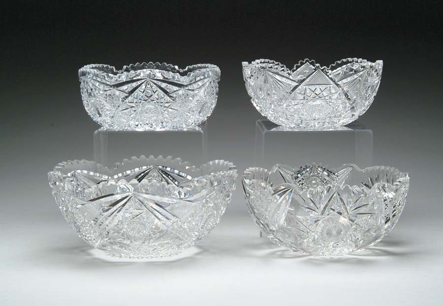 Appraisal: FOUR CUT GLASS BOWLS Cut in sunburst hobstar and fan