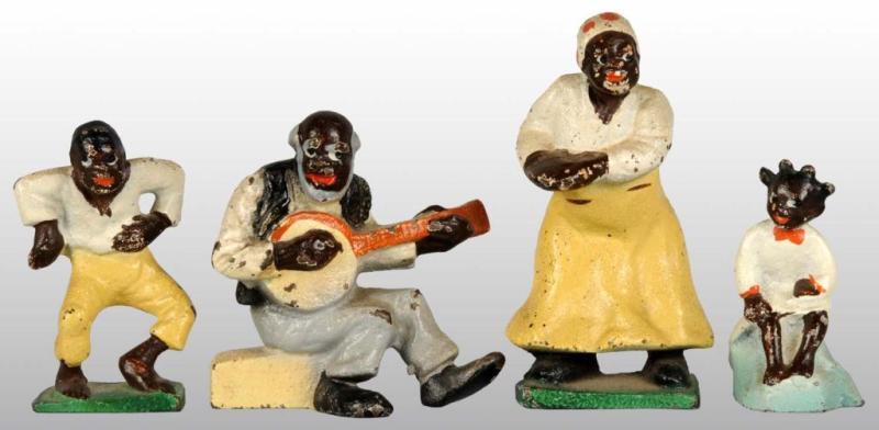 Appraisal: Complete Set of Black Family Figures Description Made by Wilton