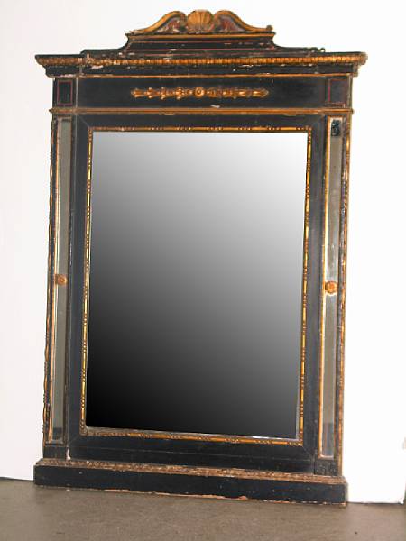 Appraisal: A Neoclassical parcel ebonized paint decorated and giltwood mirror first