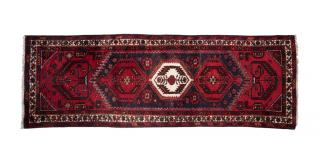 Appraisal: AN IRANIAN HAMADAN WOOL RUNNER th century The runner having