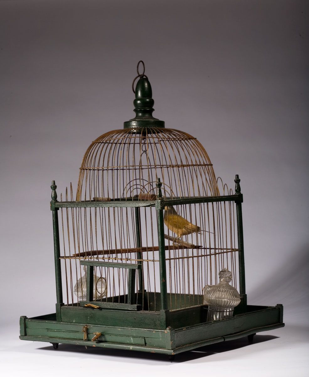 Appraisal: EARLY AMERICAN GREEN-PAINTED BIRDCAGE WITH BLOWN-MOLDED GLASS FEEDERS Height inches