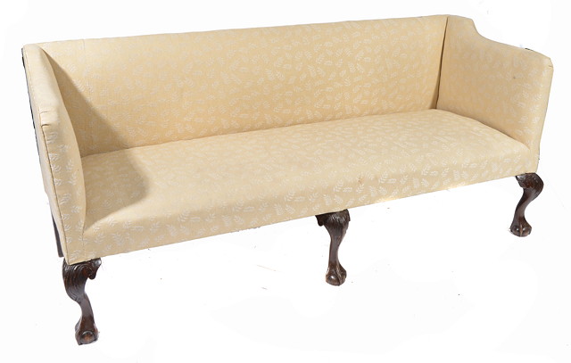 Appraisal: A GEORGIAN STYLE SOFA with overstuffed upholstered back arms and