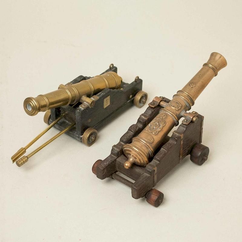 Appraisal: Pair of Model Cannons Pair of model wheeled cannons Dimensions