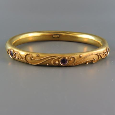 Appraisal: Victorian Gold-Filled Bangle Bracelet inset amethyst raised fancy design signed