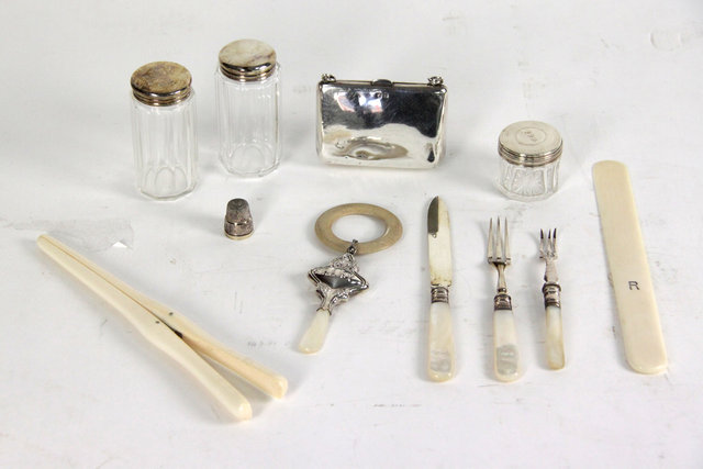 Appraisal: Three dressing table jars with silver covers a child's silver