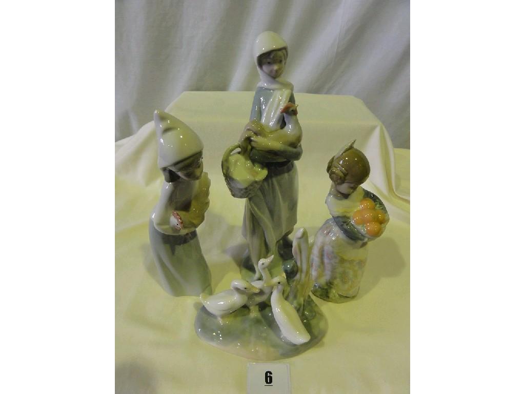 Appraisal: A Lladro Daisa figure of a little girl holding a