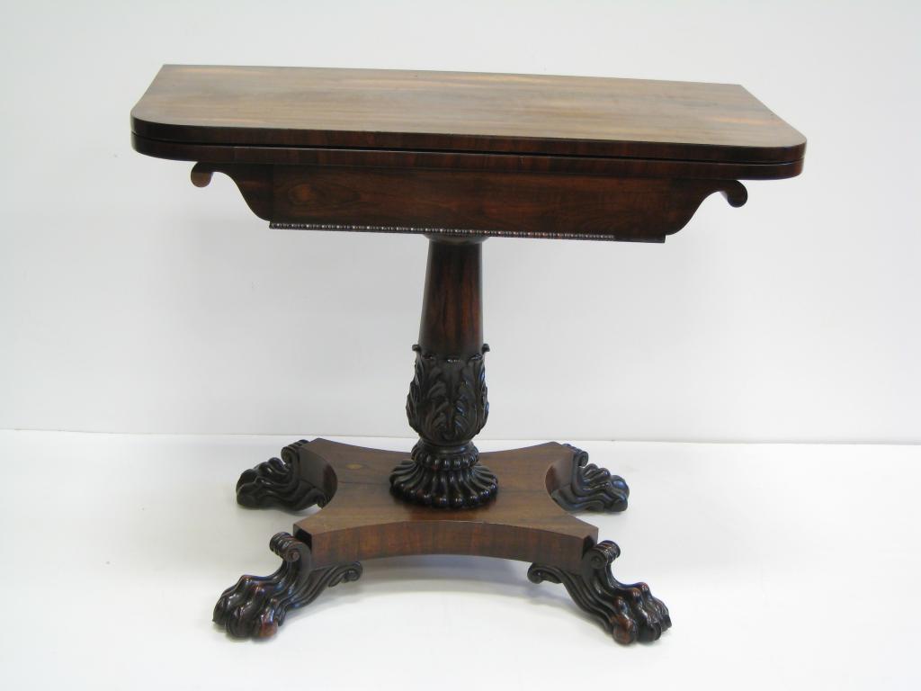 Appraisal: A Regency rosewood Card Table with fold over top carved