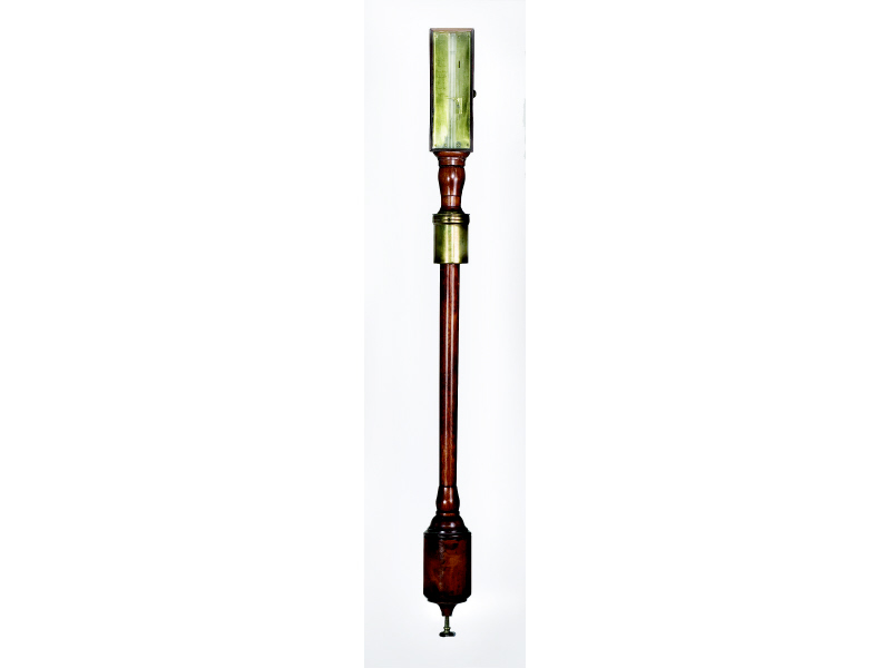 Appraisal: FRENCH MANGAVEL STICK BAROMETER Brass gauge at the top over