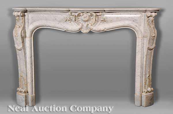 Appraisal: An Antique Louis XV-Style Carved Marble Mantel serpentine shelf shell