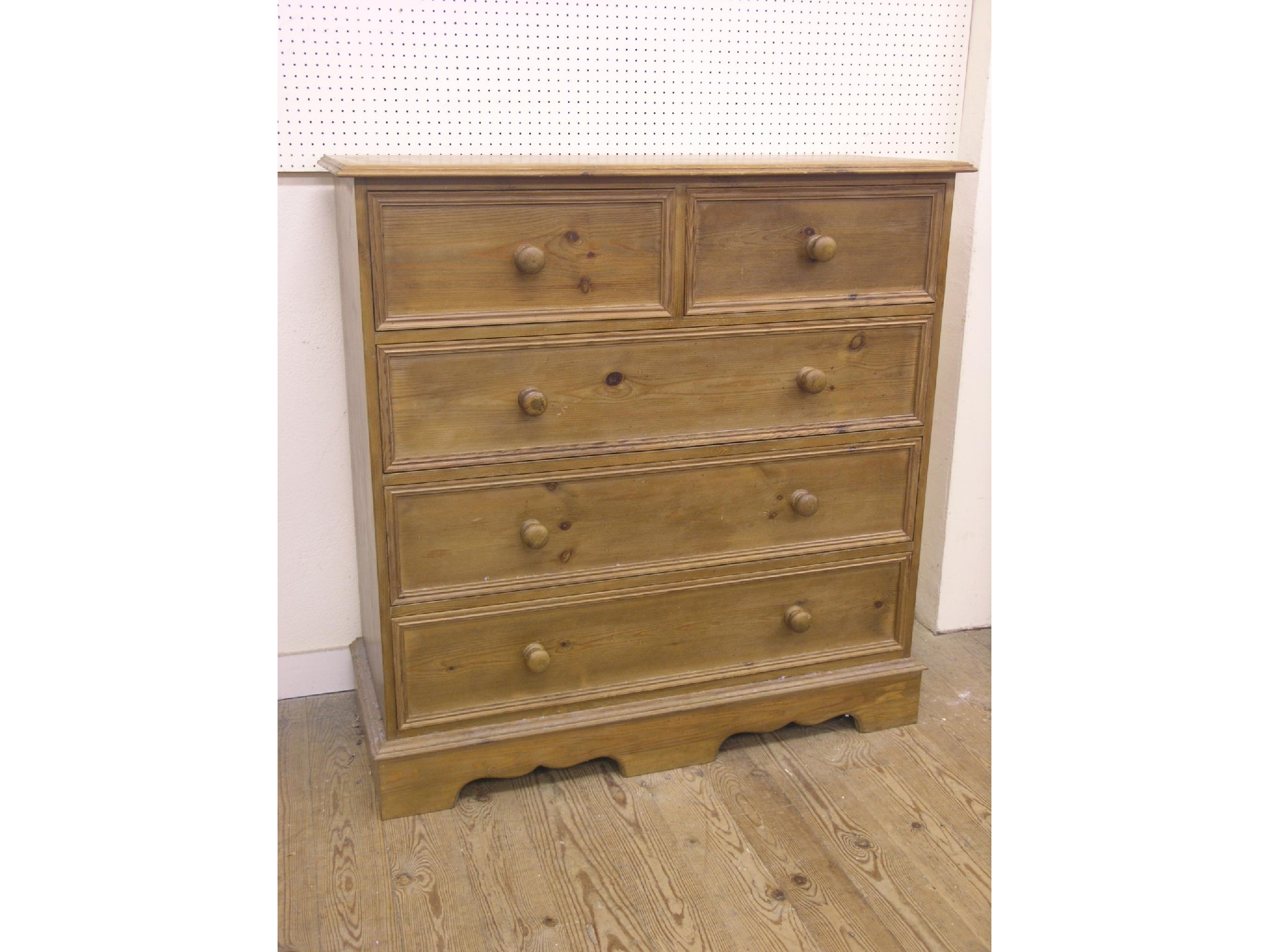 Appraisal: A waxed pine bedroom chest two short and three long