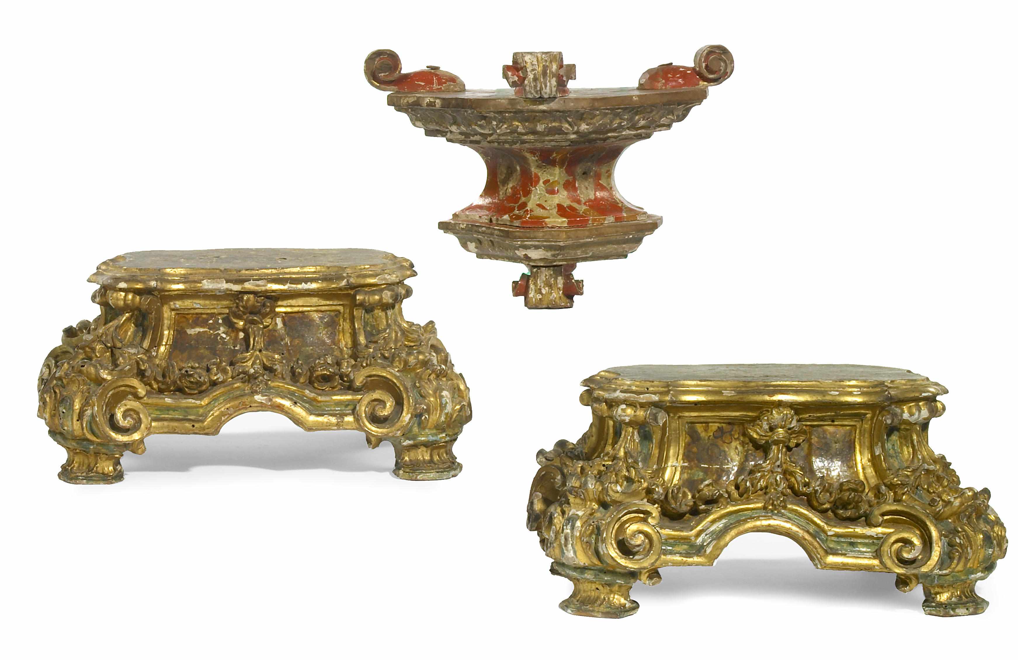 Appraisal: A pair of Italian Rococo carved giltwood and faux marble