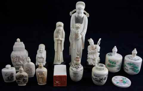 Appraisal: GROUP OF CHINESE IVORY CARVINGS including a standing figure of