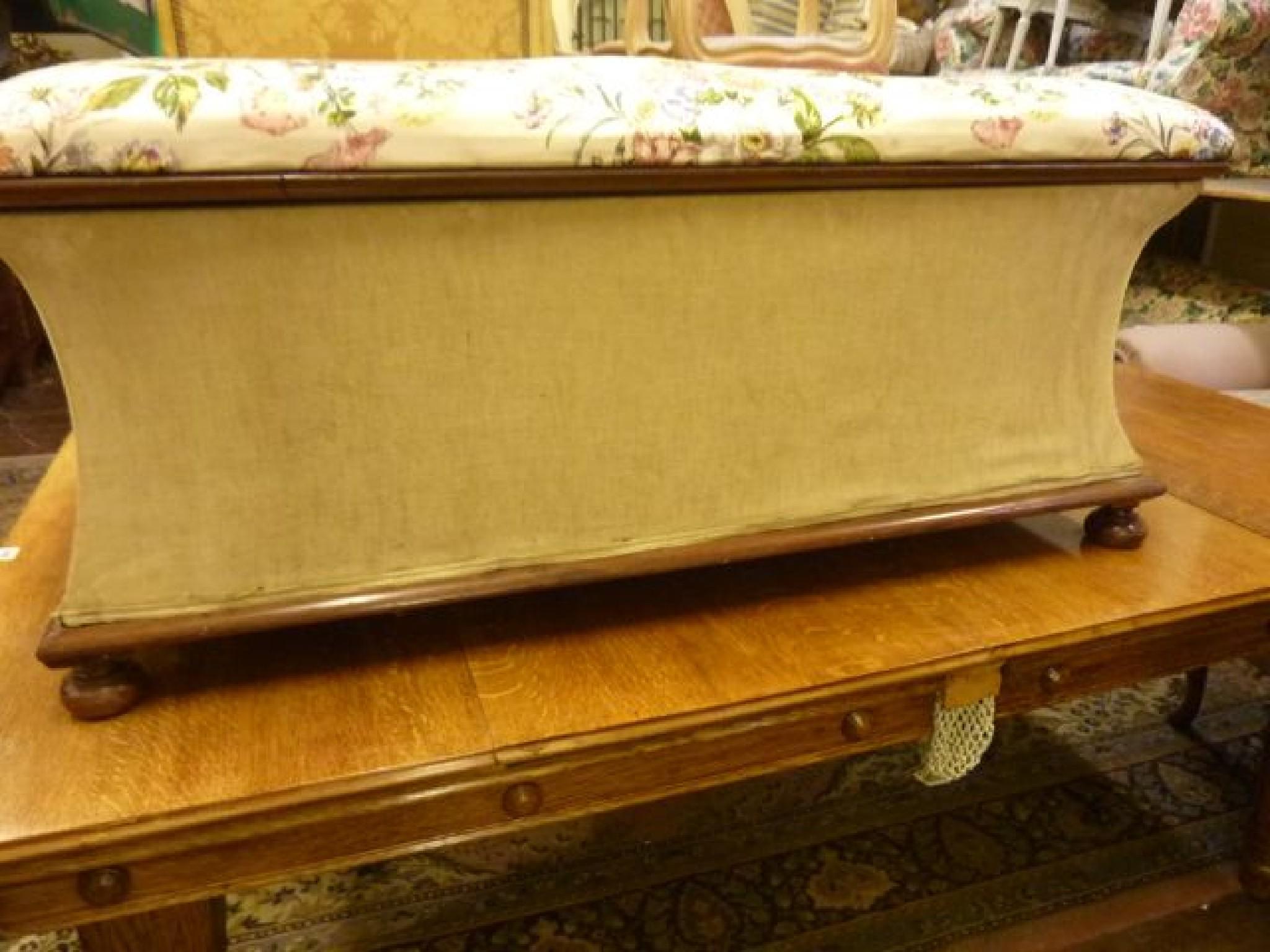 Appraisal: A Victorian box ottoman of sarcophagus form with rising lid