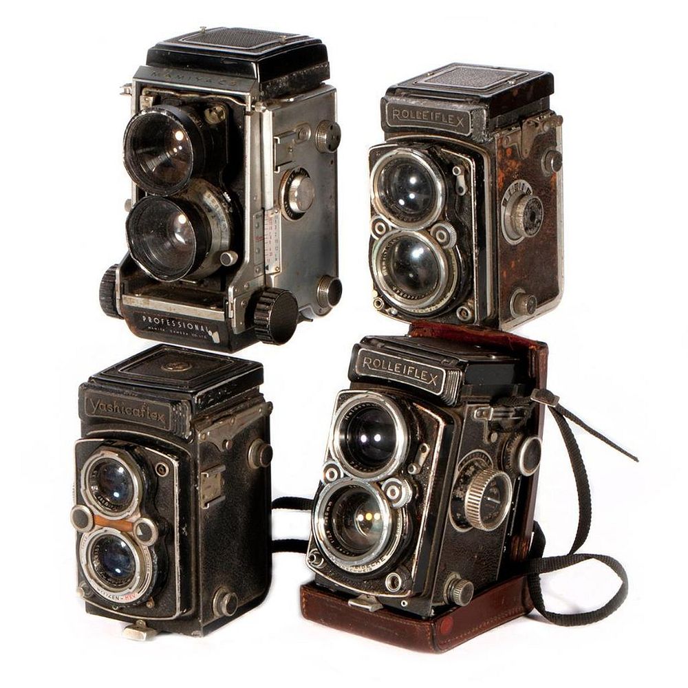 Appraisal: Four vintage cameras Four vintage cameras including two Rolleiflex a