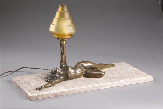 Appraisal: THREE FIGURAL LAMPS Twentieth century Two reclining nude women holding