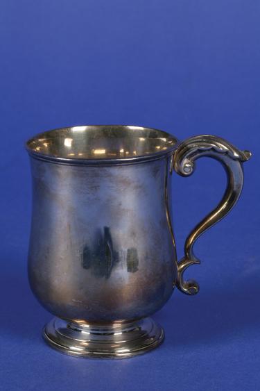 Appraisal: A GEORGE IV MUG of baluster form with a leaf-capped