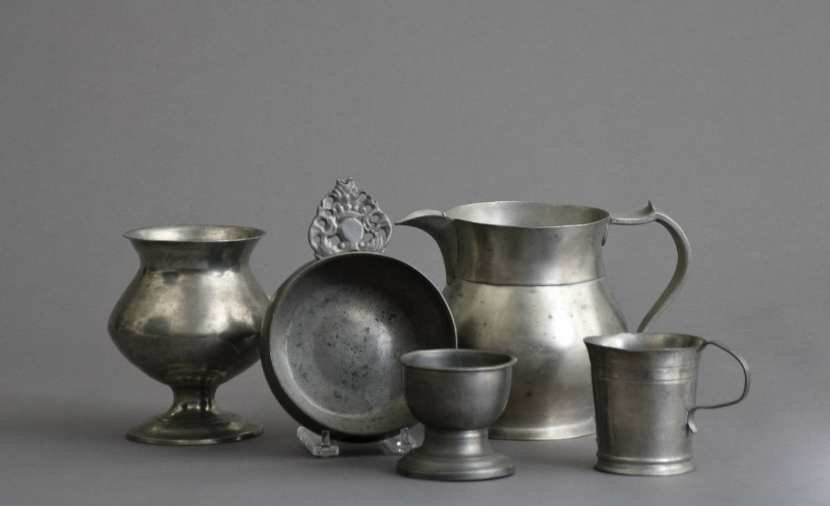 Appraisal: FIVE EARLY PEWTER TABLE OBJECTS INCLUDING AN URN-FORM FOOTED VESSEL