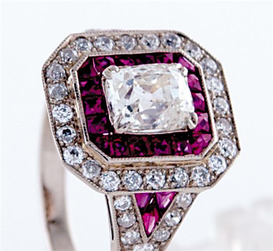 Appraisal: Art Deco style ruby and diamond ring center cushion-cut diamond