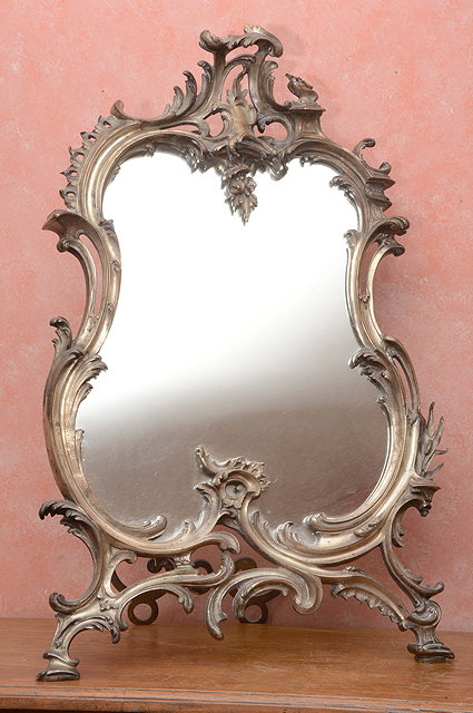 Appraisal: A TH CENTURY SILVERED ROCOCO STYLE DRESSING TABLE MIRROR with