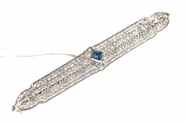 Appraisal: A K WHITE GOLD ART DECO FILIGR E BROOCH with