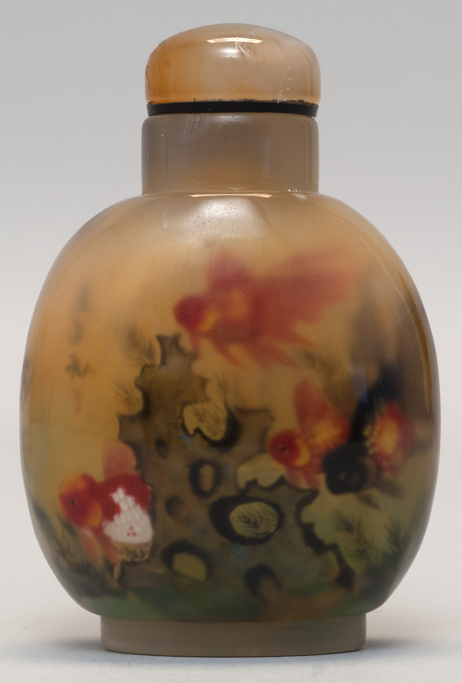 Appraisal: INTERIOR-PAINTED AGATE SNUFF BOTTLE In ovoid form with carp design